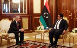 رئيس الوزراء محمد اشتية خلال لقائه رئيس المجلس الرئاسي الليبي محمد المنفي