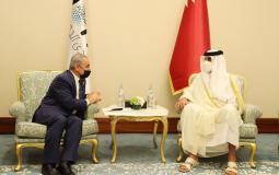 لقاء اشتية مع أمير دولة قطر