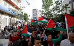 مسيرة أعلام فلسطينية في رام الله