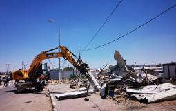 جانب من هدم آليات الاحتلال لمنشآت تجارية فلسطينية قرب حاجز الجلمة شمال مدينة جنين
