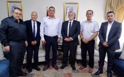 وفد من الجمعية الخيرية المتحدة للأراضي المقدسة يلتقي رئيس جامعة القدس المفتوحة