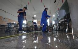 تنظيف وتهيئة الفصول الدراسية في غزة استعدادا للعام الدراسي الجديد 2022