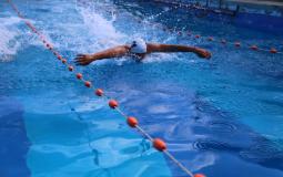 جانب من بطولة السباحة لطلبة مؤسسات التعليم العالي في قطاع غزة