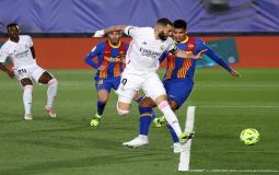 بنزيما ضد برشلونة-أرشيف.