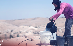 امراة فلسطينية تدلو المياه - تعبيرية