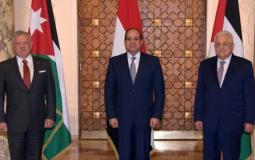 الرئيس الفلسطيني مع نظيره المصري والعاهل الأردني