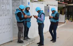 صحفيون يرتدون معدات السلامة المهنية التي وزعها بيت الصحافة - فلسطين