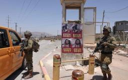 مستوطنون يضعون ملصقات تدعو للانتقام من الفلسطينيين