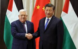 الرئيس الفلسطيني محمود عباس مع الرئيس الصيني شي جين بينغ