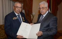 الرئيس محمود عباس ومدير جهاز المخابرات الأسبق اللواء طارق أبو رجب - أرشيفية