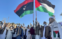رفع علمي فلسطين وليبيا - تعبيرية