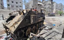 دبابة إسرائيلية مدمرة في شوارع غزة - تعبيرية