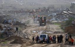 الصليب الأحمر وعناصر القسام شرق مدينة غزة