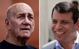 لقاء سري في أبو ظبي يجمع أولمرت ودحلان