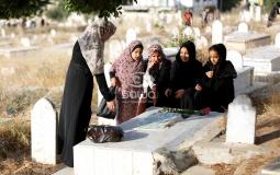  زيارة المقابر بأول أيام عيد الفطر في غزة