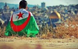 شاب فلسطيني يرتدي علم الجزائر في القدس