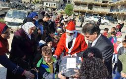 توزيع مكرمة الرئيس على طلبة المدارس- مخيم اليرموك