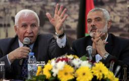 رئيس حركة حماس إسماعيل هنية والقيادي بحركة فتح عزام الأحمد