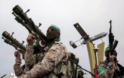 مقاتلون من كتائب القسام يحملون صواريخ مضادة للطائرات