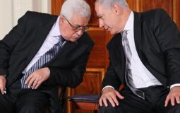 الرئيس عباس ونتنياهو خلال لقاء سابق