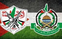 شعار حماس وفتح -ارشيف-