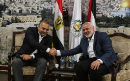 رئيس المكتب السياسي لحركة حماس إسماعيل هنية واللواء عباس كامل