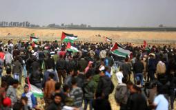 فلسطينيون مشاركون في مسيرة العودة على حدود غزة