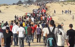 جانب من توجه المتظاهرين لإسناد المسير البحري الثامن شمال قطاع غزة