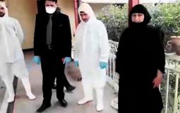 امرأة عراقية تحتفل بشفاء زوجها من فيروس كورونا