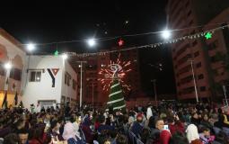 إضاءة شجرة عيد الميلاد في جمعية الشبان المسيحية بمدينة غزة اليوم