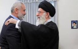 رئيس المكتب السياسي لحركة حماس إسماعيل هنية والمرشد الإيراني علي خامنئي