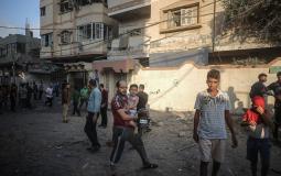 لحظة اخلاء المواطنين من قرب مبنى المسحال الثقافي غرب غزة أمس