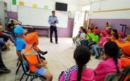 الشرطة تشارك في مخيمات صيفية 