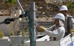 عمال من شركة كهرباء القدس