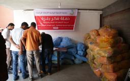 جمعية التنمية الزراعية توزع ألاف الحقائب المدرسية بغزة