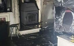 من مكان الحريق داخل منزل