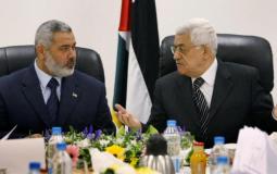 الرئيس الفلسطيني محمود عباس ورئيس المكتب السياسي لحركة حماس إسماعيل هنية -ارشيف-