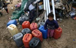 الأسر الفقيرة في غزة تتلقى مساعدات