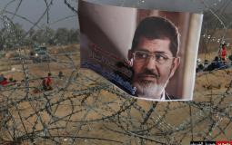 صور محمد مرسي على حدود غزة