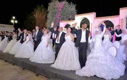 عرس جماعي في دمشق لتسعين عريسا فلسطينيا وسوريا