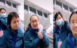 الأطباء الصينيون وهم يخلعون كماماتهم