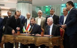 جانب من توقيع اتفاق المصالحة الفلسطينية في القاهرة - أرشيف