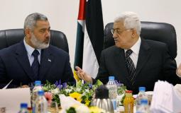 الرئيس الفلسطيني محمود عباس ورئيس حركة حماس اسماعيل هنية -من الارشيف-