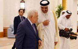 أمير قطر والرئيس عباس خلال لقاء سابق