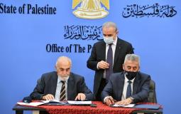 رئيس الوزراء الفلسطيني محمد اشتية خلال توقيع اتفاقية لاستكمال إعداد المخطط الوطني التنموي المكاني