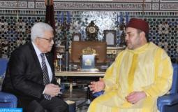 ملك المغرب والرئيس عباس خلال لقاء سابق
