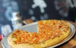 "البيتزا" تتسبب باعتقال مهاجر غير شرعي