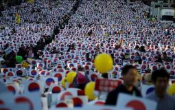 مظاهرات في شوارع كوريا بسبب فضيحة فساد لوزير العدل