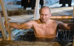 الرئيس الروسي بوتين يغوص في بحيرة جليدية