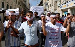 جنازة خريجي غزة تجوب شوارعها وتستقر عند وزارة العمل-APA